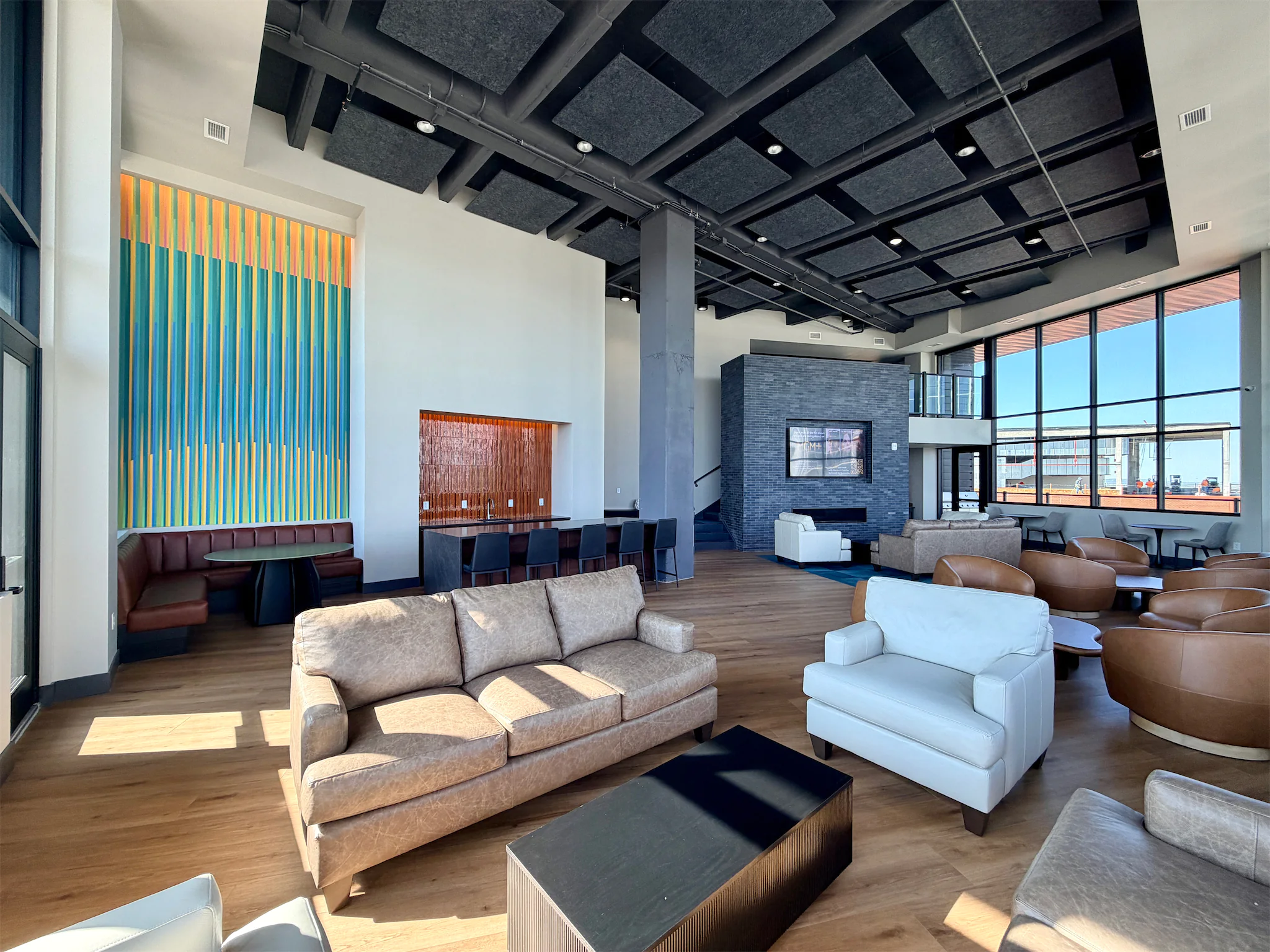 Bright apartment living room with modern finishes at The Duo Omaha