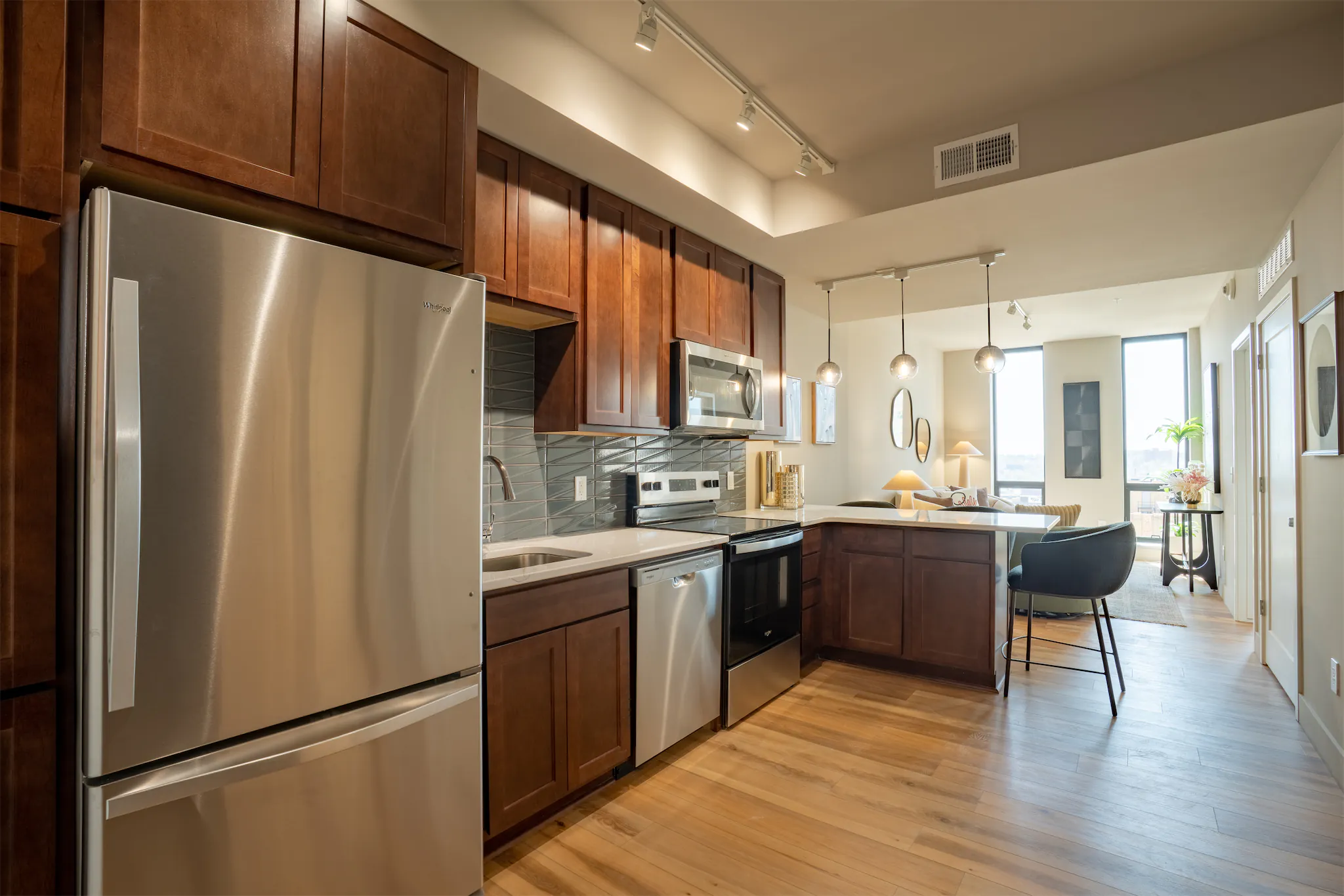 Modern kitchen and dining layout inside a Duo apartment