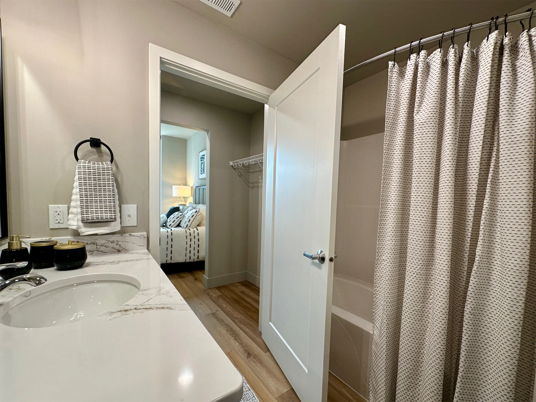 Exterior and lifestyle view highlighting The Duo community design